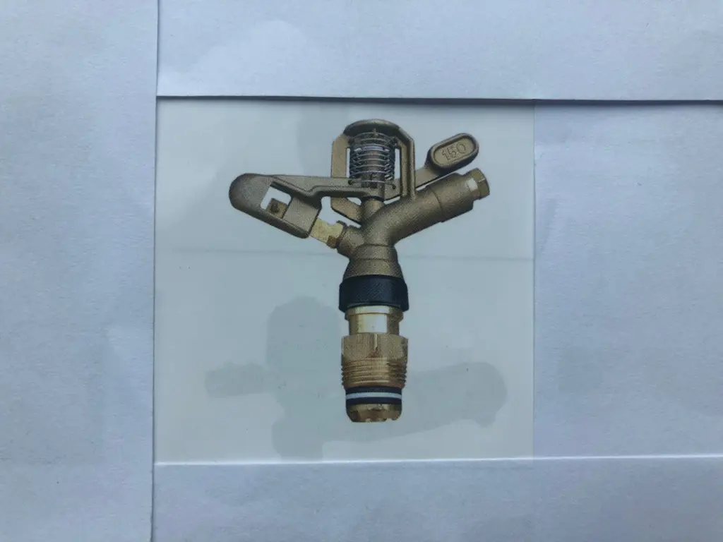 8f25f31a-5570-4590-8be6-78663a9dea90-Kreisregner Messing mit 2 Düsen.jpg