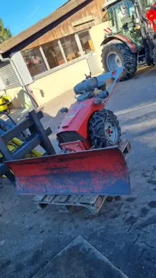 Schneepflug Motormäher