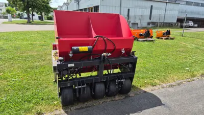 Selbstladender Sandstreuer