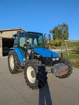 Tracteur NewHolland TL 100 avec chargeur Quicke Q 36