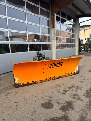 Lame à neige Boschung avec délestage incorporé