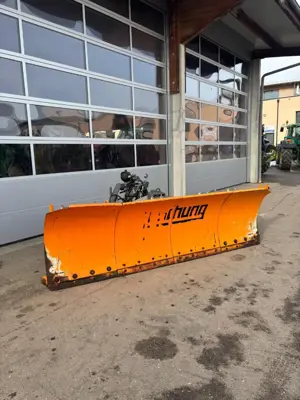 Lame à neige Boschung avec délestage incorporé
