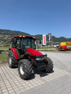 Case IH JX1070U mit Hydrac Frontlader