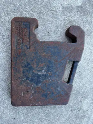 Cherche Masse Case IH 47kg