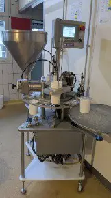 fb73c8a4-6d47-4245-ba71-f1bcab02a06b-Abfüllmaschine Maximize für 500g + 180g Becher.jpg