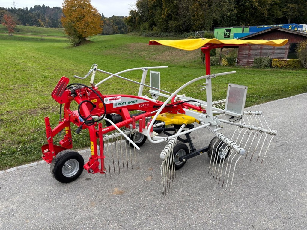 80815763-9acd-44ee-8947-8e561d293ea1-23073 Pöttinger Kreiselschwader Top 342 (2).jpg