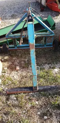 Pince pour balles rondes et carrées