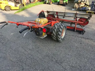 Motormäher Bucher M500 mit Bandeingrasung