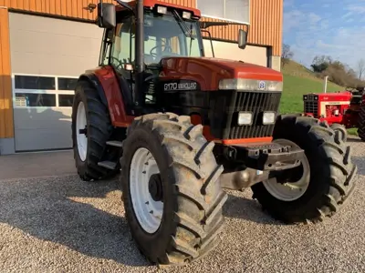 Traktor New Holland G170 / 8670