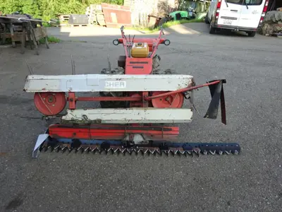 Motormäher Bucher M500 mit Bandeingrasung