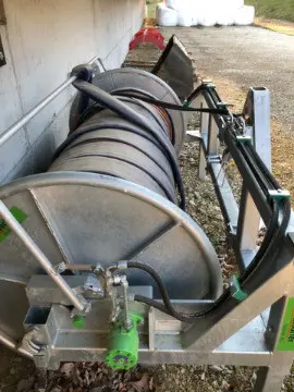 Enrouleur et tuyaux pour le lisier