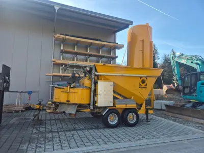 Betonmischanlage FIBO B1200 auf Fahrwerk mit Silo