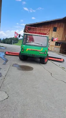 Schiltrac 532 mit Lüönd Heckader Favorit -S