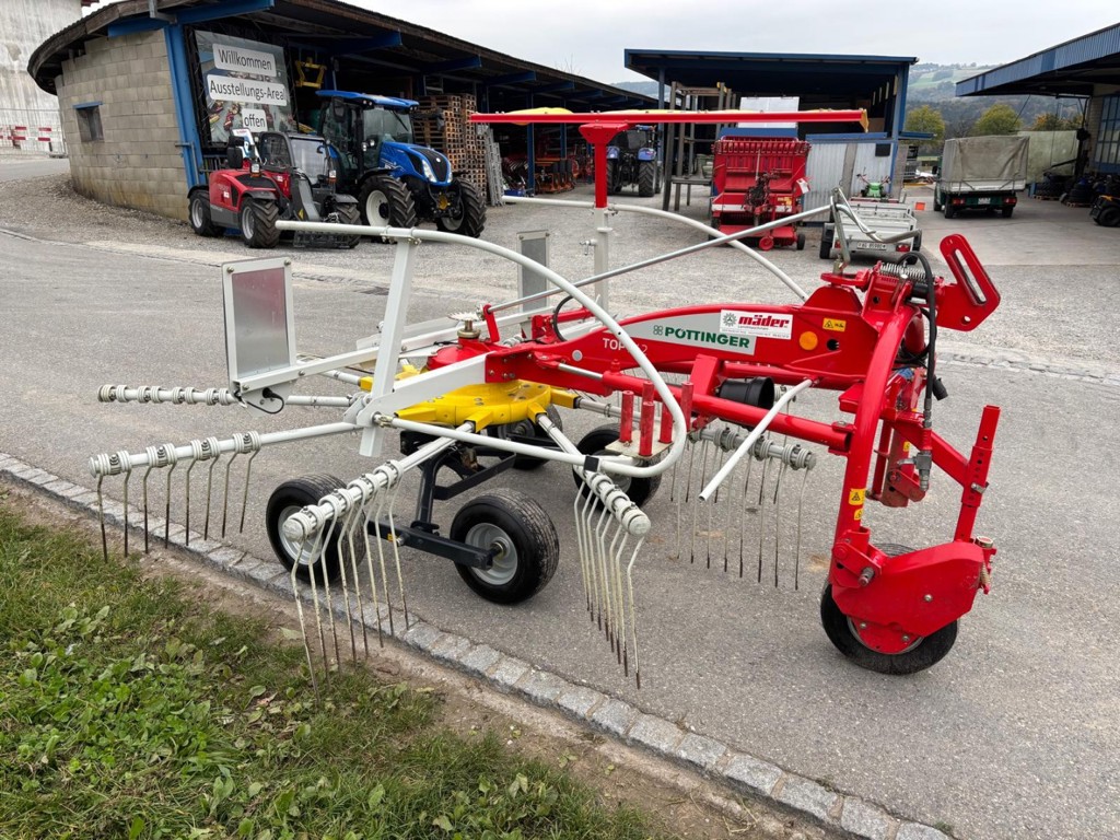 027b7585-1fe1-42e8-bebb-72c6a4617130-23073 Pöttinger Kreiselschwader Top 342 (1).jpg